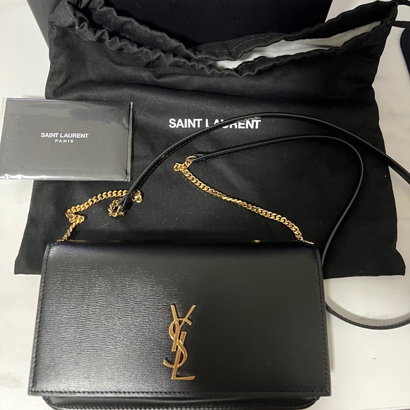 Saint Laurent CASSANDRE PHONE HOLDER IN SMOOTH LEATHER - Picture 1 of 9